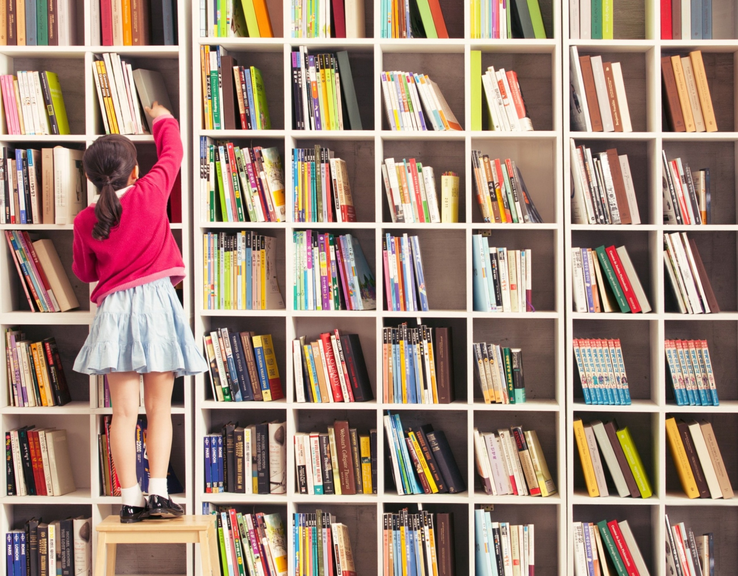 A learner reading and writing