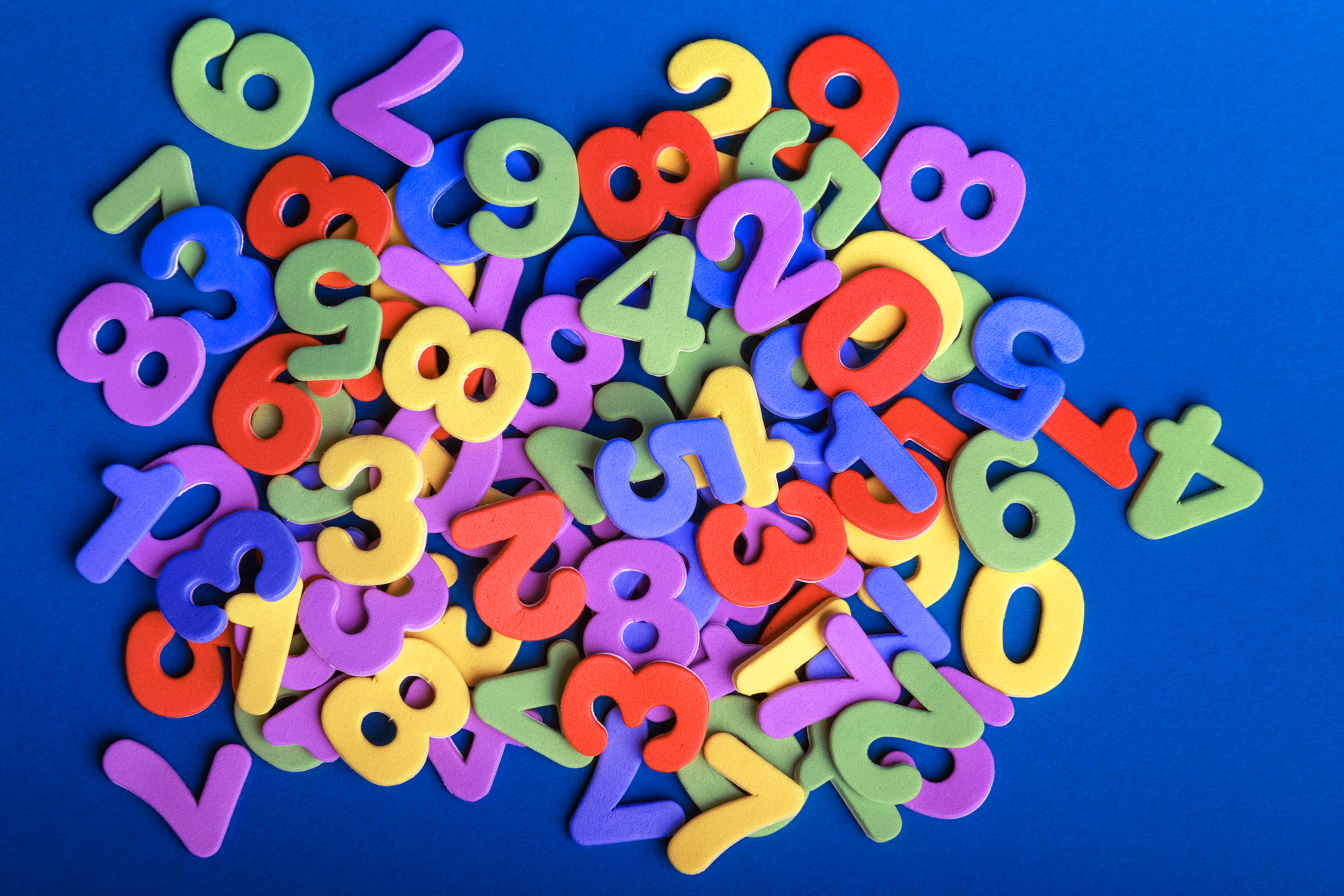 Colourful magnetic numbers